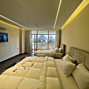 Triple Room balcony pyramids view